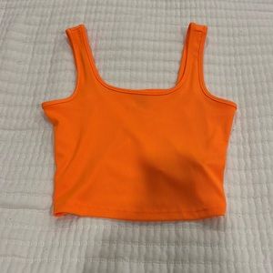 bright orange top